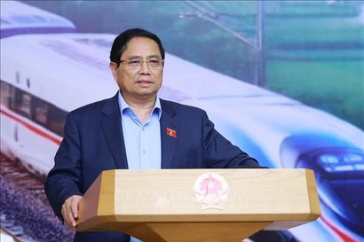 Le Premier ministre Pham Minh Chinh s'exprime lors de la réunion. Photo: VNA