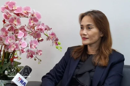Nguyen Thi Thanh Van, vice-présidente de l’Association des entreprises vietnamiennes en Malaisie, répond à un entretien de la VNA. Photo: VNA