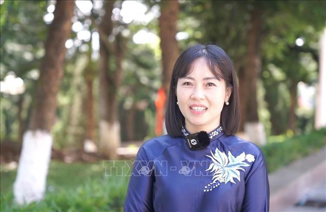 Dào Thi Thanh Nhan, vice-présidente de la Commission de la sensibilisation, de l'éducation et de la mobilisation des masses du Comité provincial du Parti de Lai Châu. Photo: VNA vna-potal-gop-y-du-thao-van-kien-dai-hoi-dang-xiv-niem-tin-va-khat-vong-phat-trien-dat-nuoc-hung-cuong-hanh-phuc-stand-1.jpg