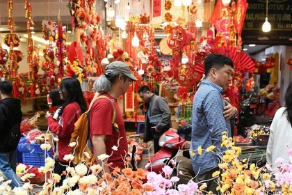 Les Vietnamiens profiteront de neuf jours de congé pour célébrer le Têt à leur manière. 